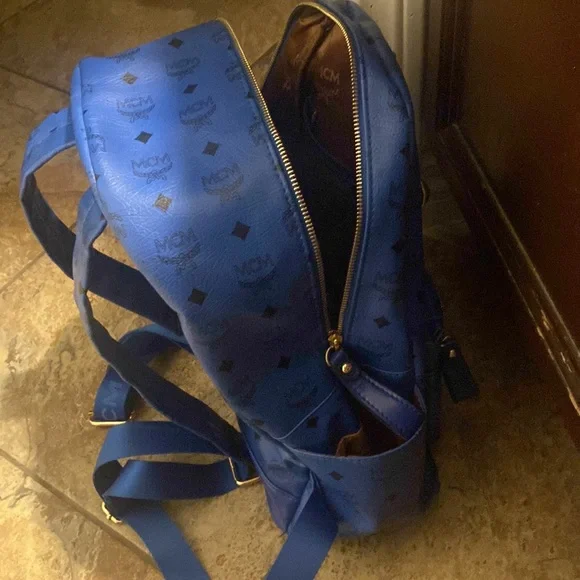 selling MCM backpack color is blue